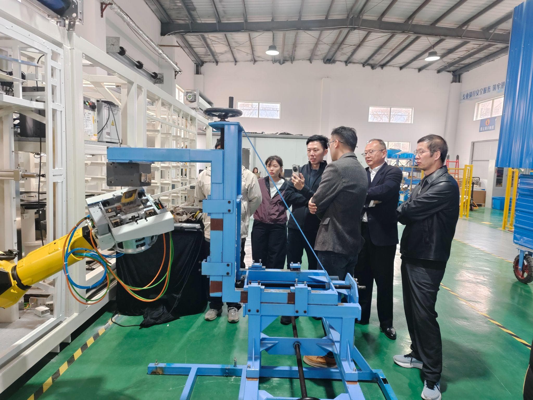 The PSA delegation reviews technical details